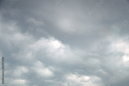 Fotografie Dramatic dark overcast storm clouds in sky before heavy rain