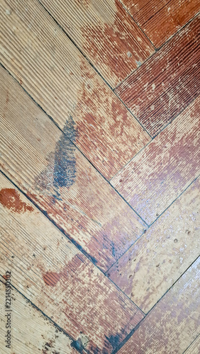 Worn out parquet wood floor