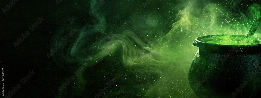 Fototapeta premium Halloween cauldron bubbling with green magic potion