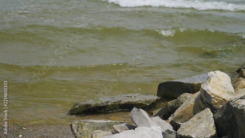 July 12, 2025, Russia, Republic of Dagestan, Kaspiysk. A rocky beach on a sunny day