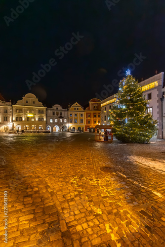 Christmas tree decorating main square in Cesky Krumlov at night