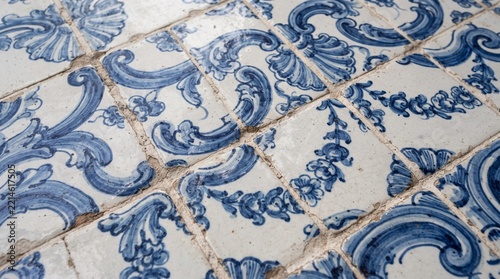 Smoothly undulating Portuguese ceramic tile surface viewed from an elevated angled view.
