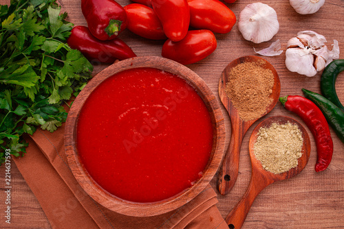 Georgian sauce, Satsebeli sauce, tomato and sweet pepper sauce, with spices, in a wooden bowl, homemade, no people,