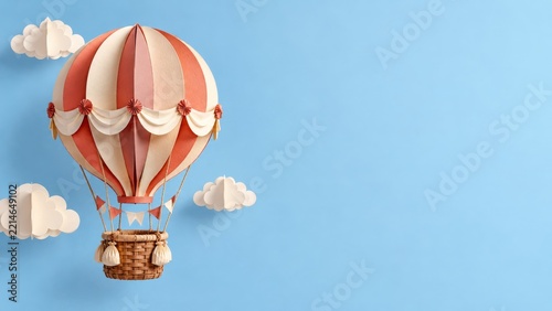 Coral and Cream Paper Hot Air Balloon with Clouds on Blue with Copy Space