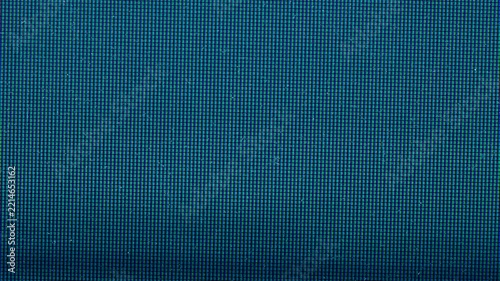 macro video footage of a television screen displaying a defective digital signal. Individual RGB pixels and subpixel patterns are clearly visible, combined with subtle interference, distortion.