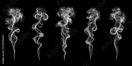 Beautiful smoke rings forming elegant abstract swirling shapes against clear background