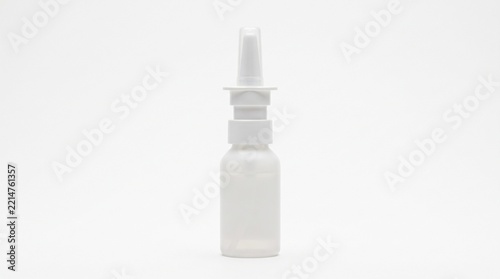 White nasal spray bottle on a plain background