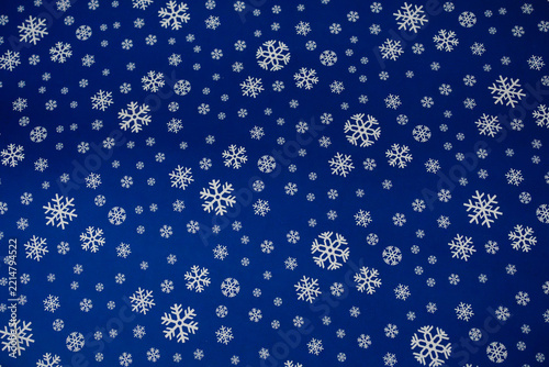 Horizontal Top-Down View of White Snowflake Pattern on Royal Blue Background