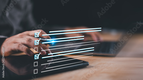 Marketing analyst completes a customer survey using a digital questionnaire for feedback, satisfaction, market research, evaluation, data collection, quality assessment, customer experience analysis.