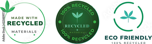 Green recycled materials vector badge and logo set featuring leaf illustrations for eco friendly products