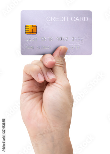 A close-up man hand holds a silver card isolated on white background with a clipping path.