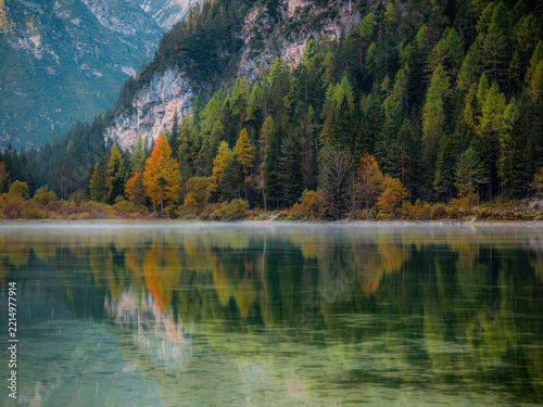 Dolomites, Scenic autumn morning scenery with trees . Travel and landscape banner, Italy
