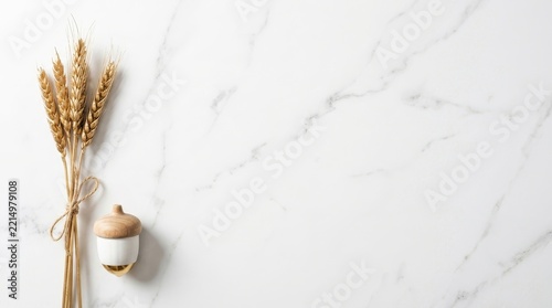 Stalk of wheat on white marble background flat lay copy space 