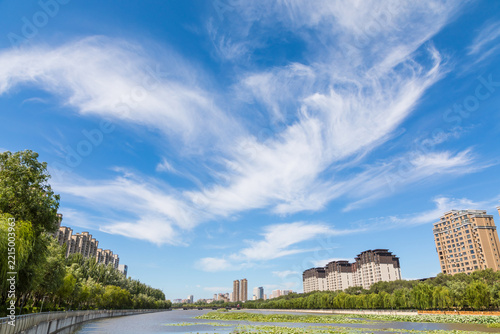 Clouds in the sky and the city's wetlands
