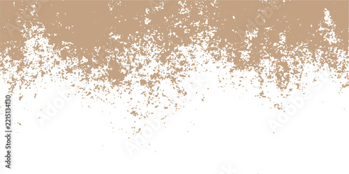 Sandy beige splatters on a clean white background with soft diffused lighting for abstract design