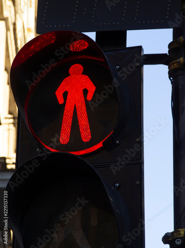 The red flashing pedestrian sign