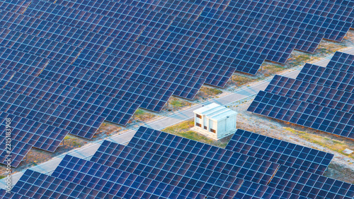 Solar Energy Farm Aerial over thousands of Solar Collectors