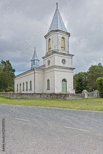 Hellamaa Orthodox Church, also known as the Church of Saints Peter and Paul, located on Muhu Island in Estonia in summer with clouds in the sky, Europe.