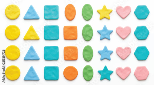 Set of colorful handmade playdough shapes arranged in organized rows