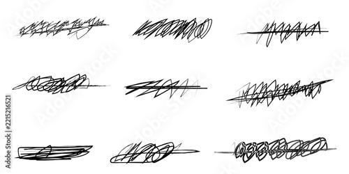 Set of hand drawn black ink scribble brush strokes isolated on a white background