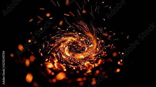 Glowing Fire Embers and Sparks Rising on Black Background