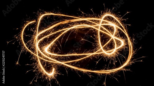 Golden Sparkler Light Trail Swirls on Black Background Overlay