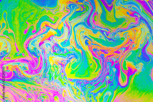 Psychedelic multicolored background abstract. Rainbow colors. patterns background. Photo macro shot of soap bubbles