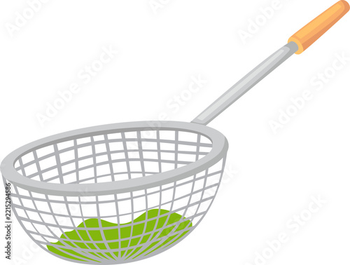 Skimmer with green leaves kitchen utensil for cooking and straining food.