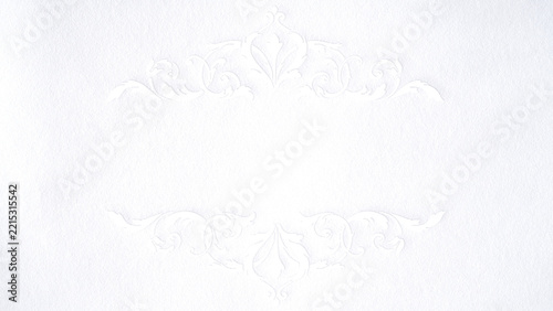White embossed vintage frame background, elegant ornamental border, luxury paper texture, classic decorative template, floral corner design, wedding invitation backdrop, minimalist blank card mockup