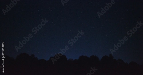 Bright Green Perseid Meteor Streaking Across Starry Night Sky