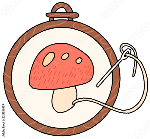 wooden embroidery hoop with mushroom shape illustration.