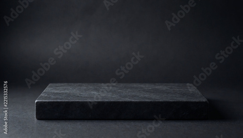 Empty dark stone platform with side lighting