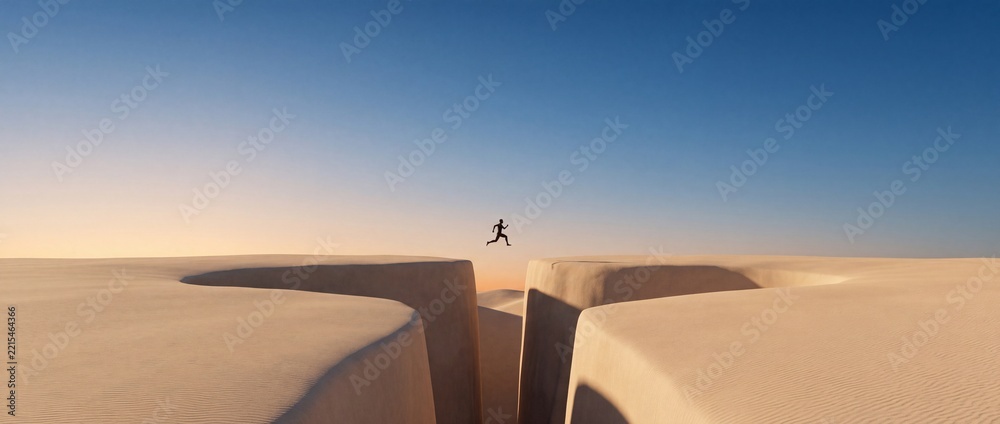 Naklejka premium Silhouette of a man jumping over a wide gap between sand dunes in a vast desert at sunset, representing courage, overcoming challenges, and achieving success in a wide conceptual landscape.