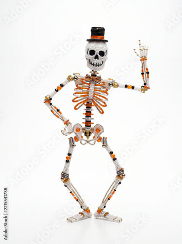 Beaded skeleton in top hat dancing robot dance