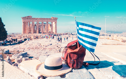 greek flag leather backpack straw hat acropolis parthenon background athens greece travel concept