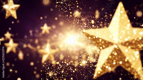 Sparkling golden stars glowing with magic dust animation moving across dark background motion video