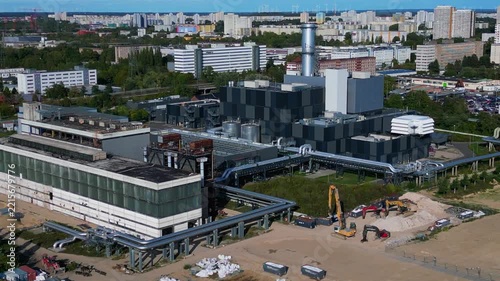 Combined Cycle Power Plant generating heat and energy Smooth aerial view drone