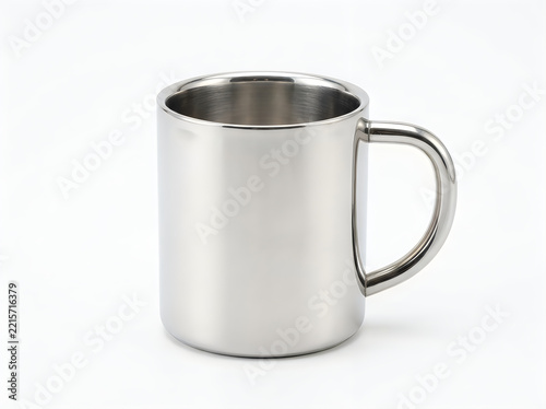 A polished stainless steel mug with a doublewall design and a sturdy handle, isolated on white background