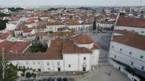 Aerial view of the Church of Our Lady of Piety surrounded by historic red-tiled rooftops and a town square in Santarem, Santarem, Portugal.