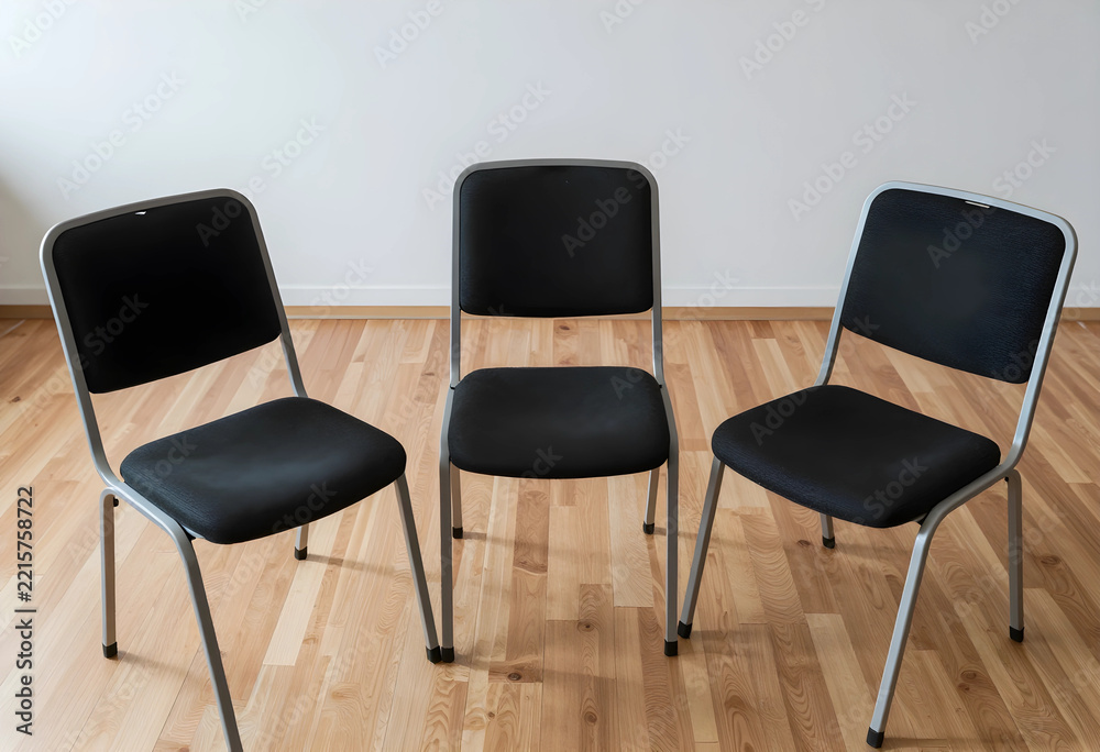 Obraz premium Unemployment and corporate downsizing, three empty office chairs in a row job loss and remote work shift in a modern business environment