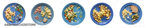 Unfinished breakfast meals on blue ceramic plates isolated. Partially eaten scrambled eggs bacon potatoes and toast scraps remaining png. Messy food waste on dishware after morning eating PNG