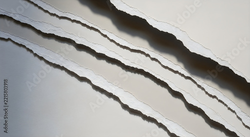 Abstract layers of torn paper with rough edges