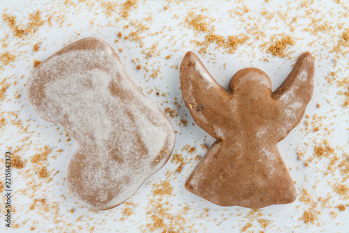 Christmas cookie with crumbs on white background