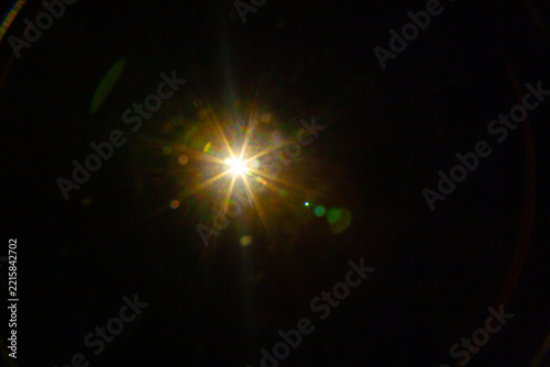 Sun flare on the black background