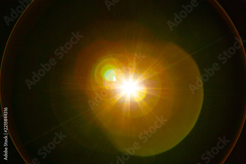 Sun flare on the black background