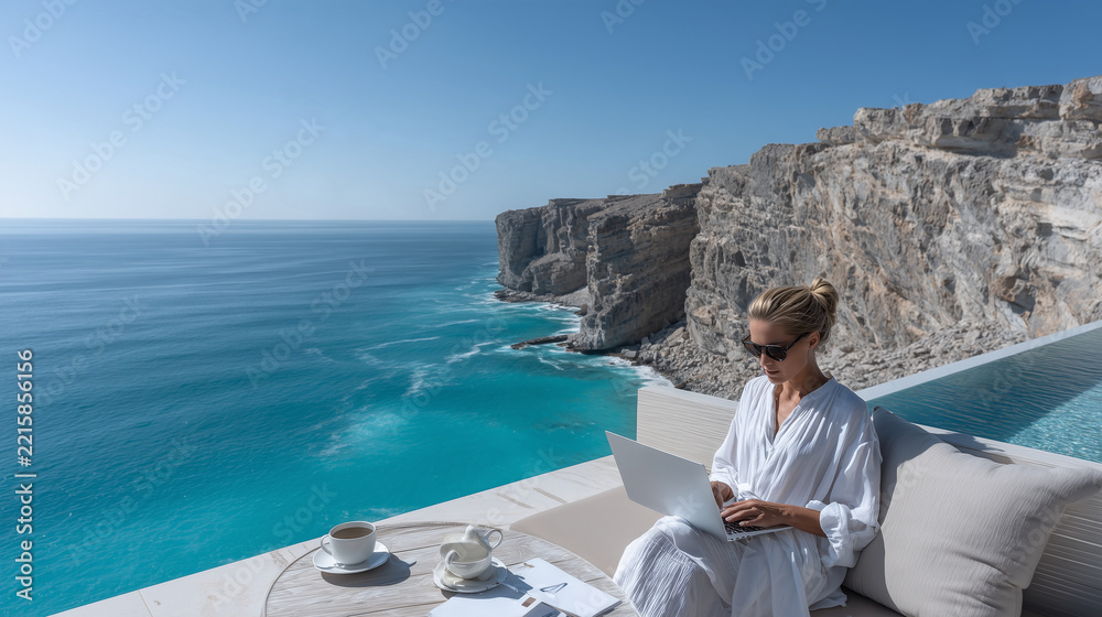 Fototapeta premium Elite Travel Advisor Reviewing Expedition Itinerary on Cliffside Terrace for Luxury Travel Campaigns