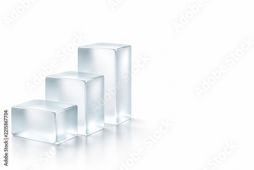 Three clear glass rectangular blocks arranged in a staircase formation