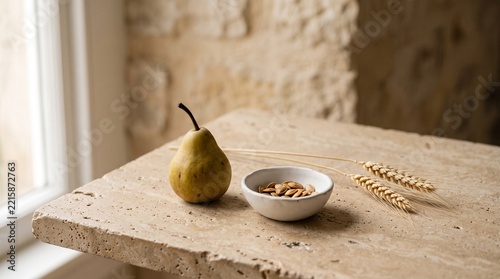 Fresh pear with pumpkin seeds on rustic concrete countertop