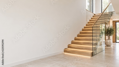 Modern Oak Staircase with Clear Glass Balustrades and Warm Step Lighting
