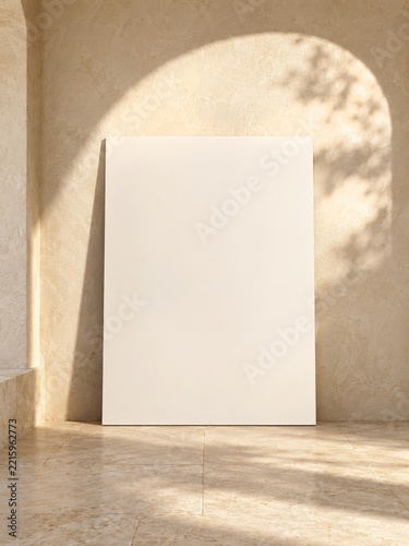 Blank White Poster Leaning against Cream Wall beneath an Arch of Sunlight